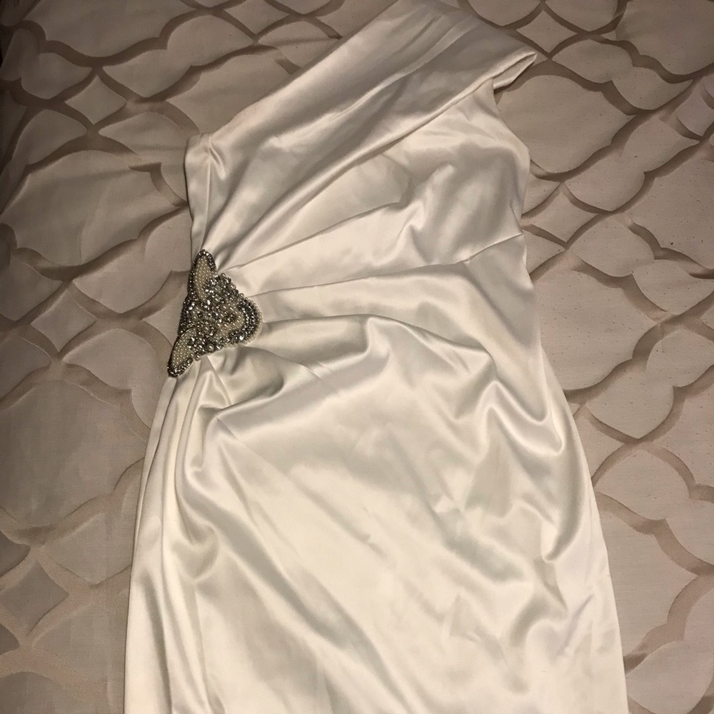 David’s Bridal knee length white dress w/ pearls and rhinestones. One shoulder.